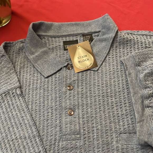 Men’s short sleeve polo blue w/knit band at the bottom. New. Stain blocker. Nice - Picture 2 of 3